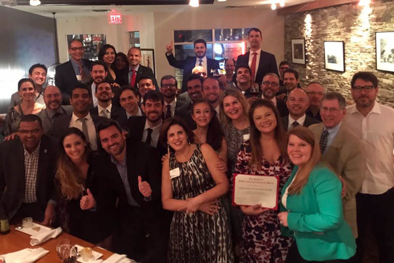 Claudia Avellaneda and a group of LEAP students.