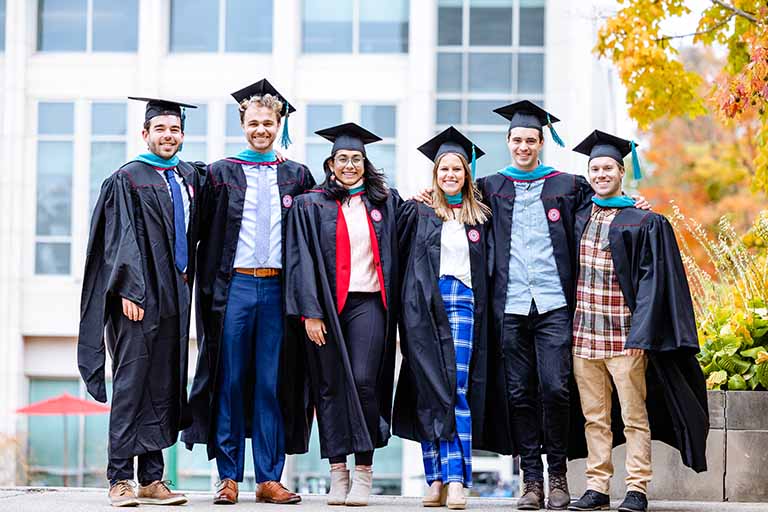 Group of grads in front of the O'Neill building